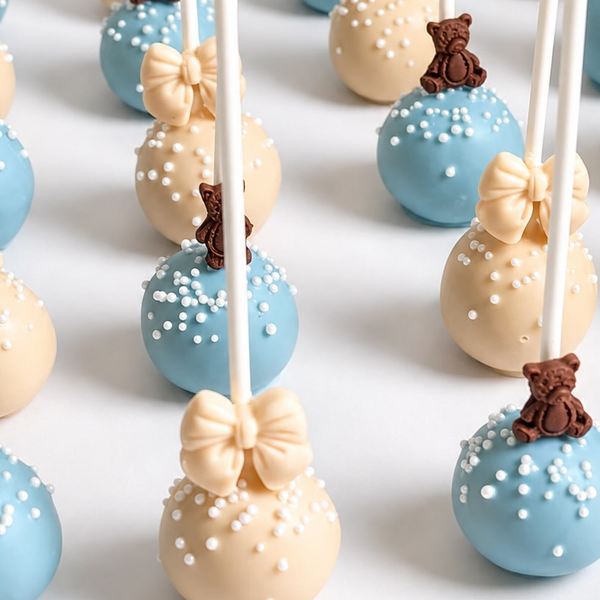 Blue and beige cake pops with teddy bears and bows